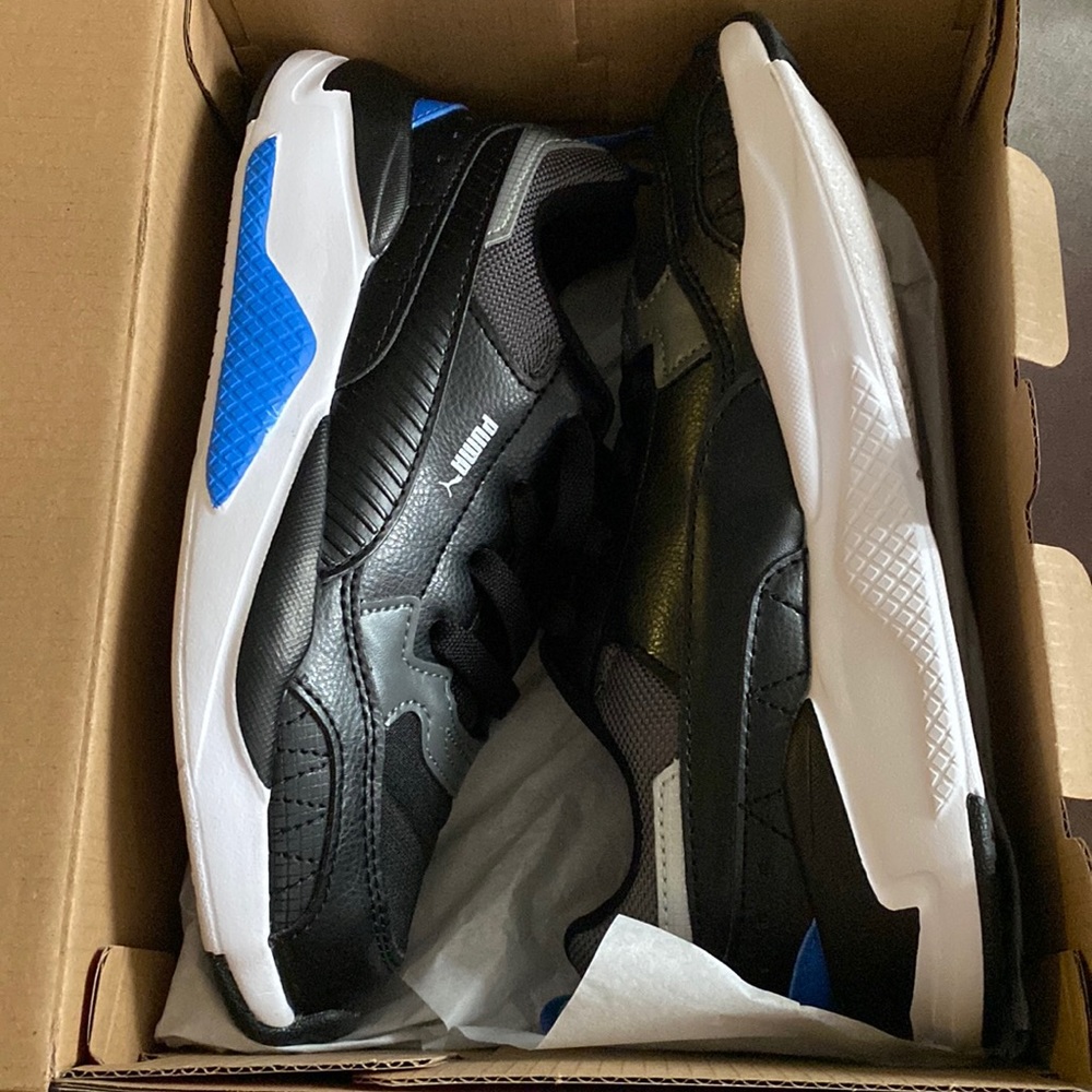 Boys Puma sneaker. Like new-only worn for 2 hours because my Son has wide feet.